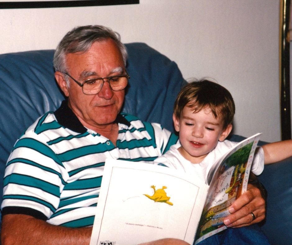 Ed reading to grandson Trevor